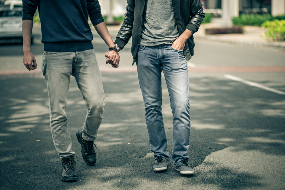 gay men holding hands