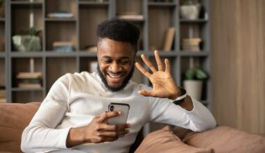 Man smiling at phone